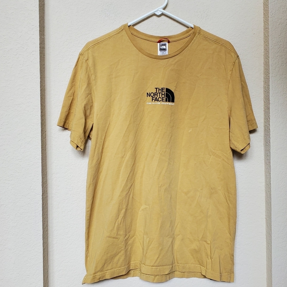 The North Face Men's Gold T-Shirt. Size Large